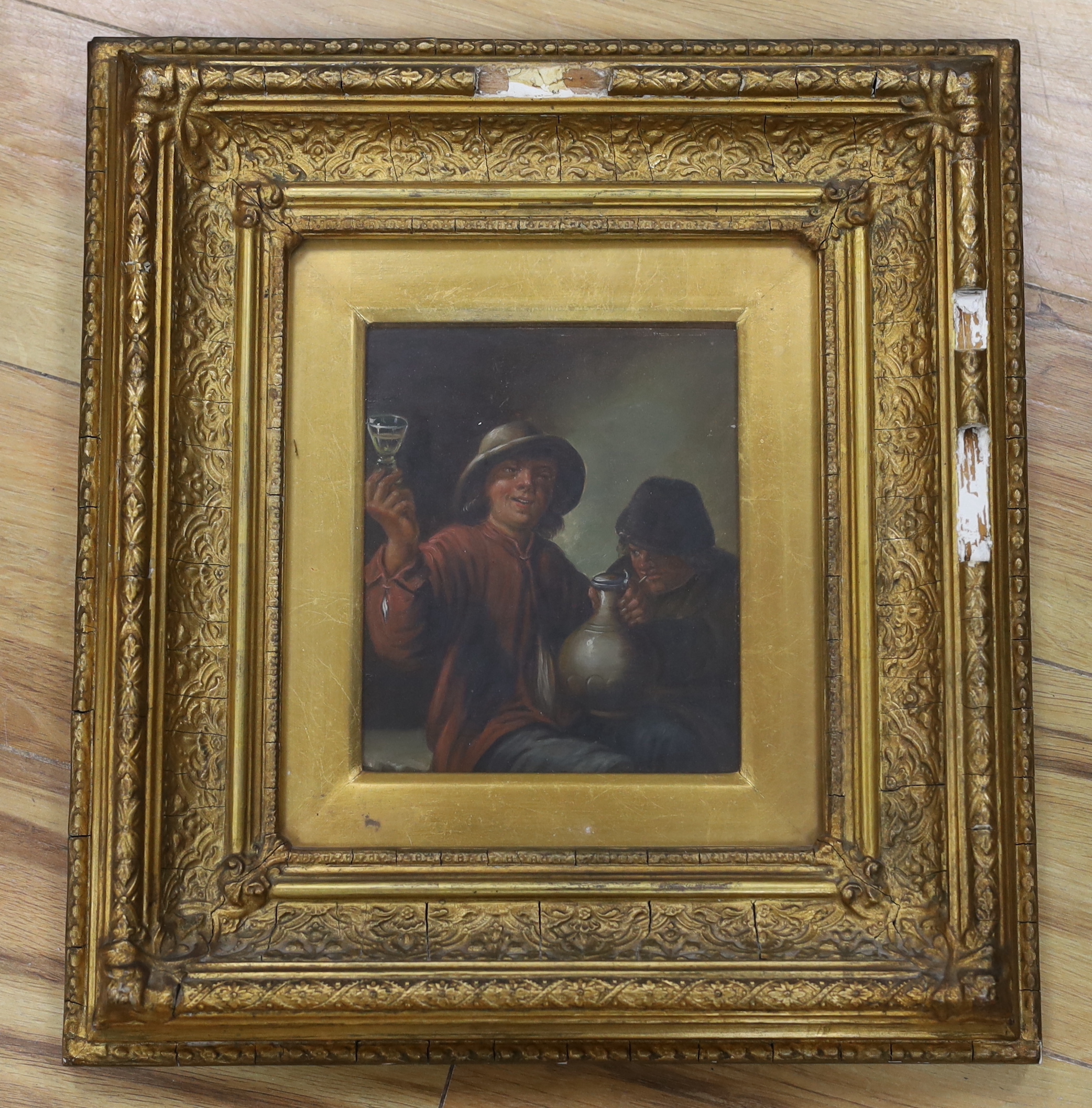 19th century Dutch school, oil in tin, Two figures drinking, 19cm x 15cm, ornate gilt frame